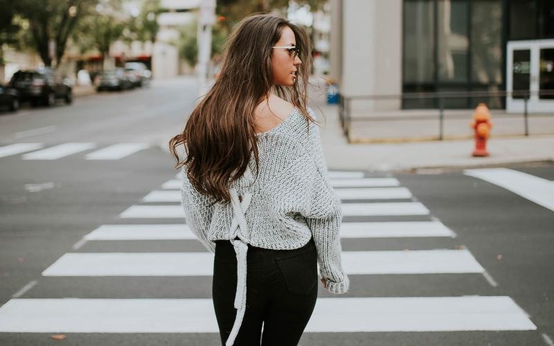 a person walking in a crosswalk