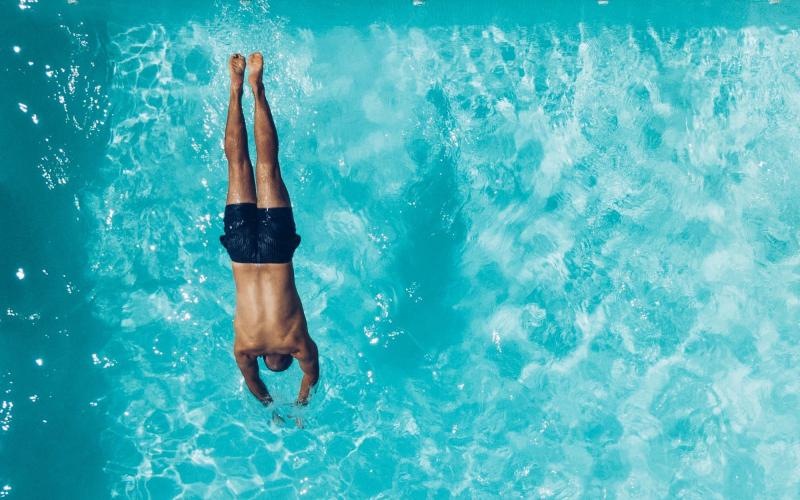 a man swimming in the water